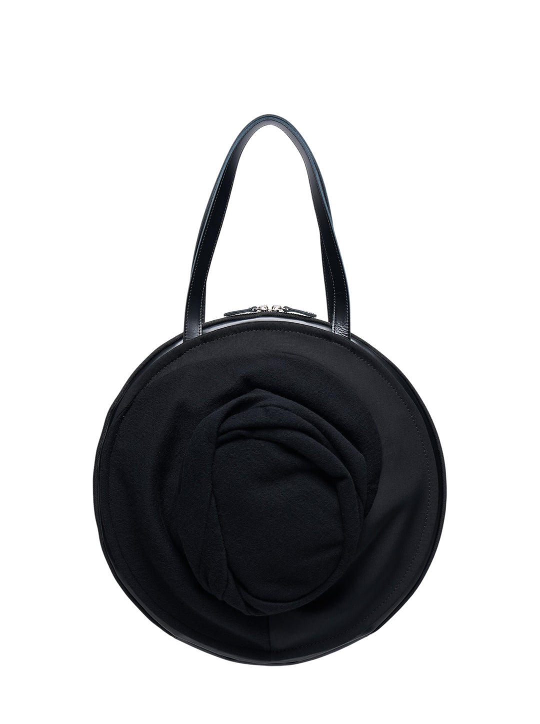 Junya Watanabe black circular top handle bag with three-dimensional draped rose appliqué on the front, leather strap, and silver-tone zip closure