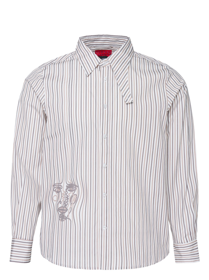 KidSuper Studios long sleeve striped button-up shirt in white, grey and taupe with an abstract line-drawn face print at the hem and an asymmetric collar