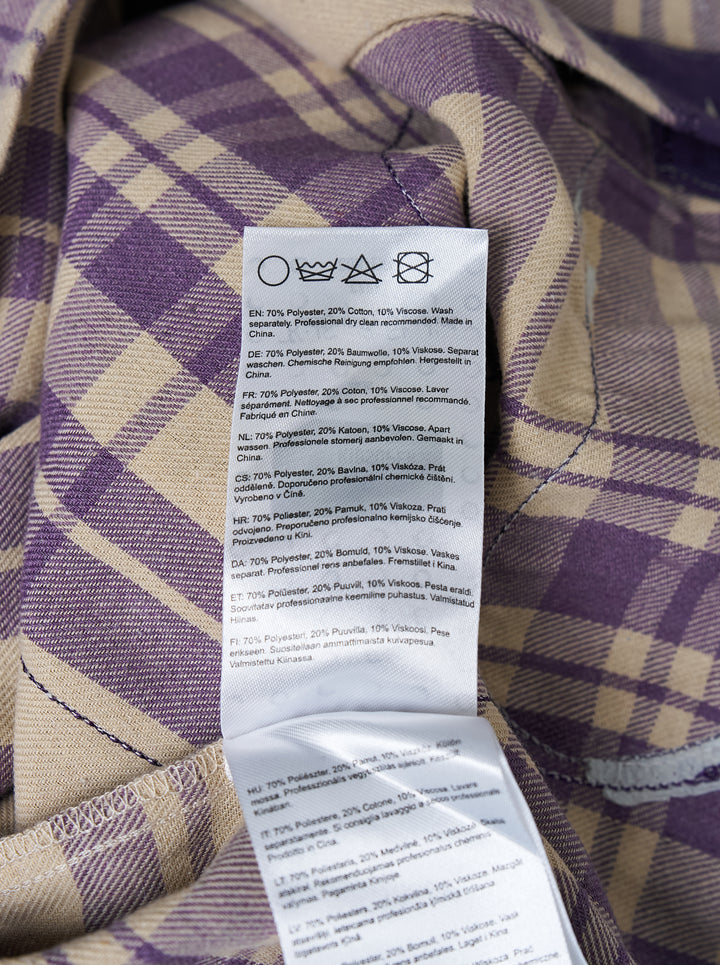 KidSuper Studios Patchwork Face Flannel Shirt in purple and cream plaid with abstract appliqué face panels, shown from the front - view 3