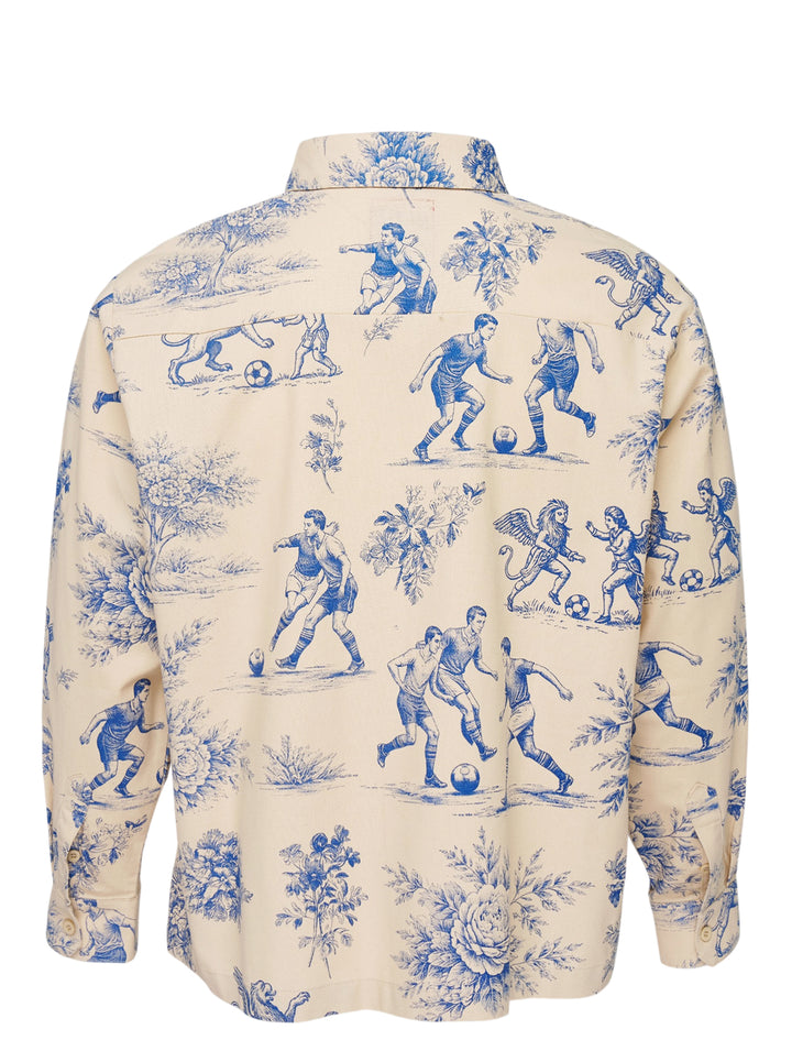 KidSuper Studios cream long sleeve button-up shirt with blue toile de Jouy print of footballers, winged griffins and peonies, with asymmetric collar and chest pocket - view 2