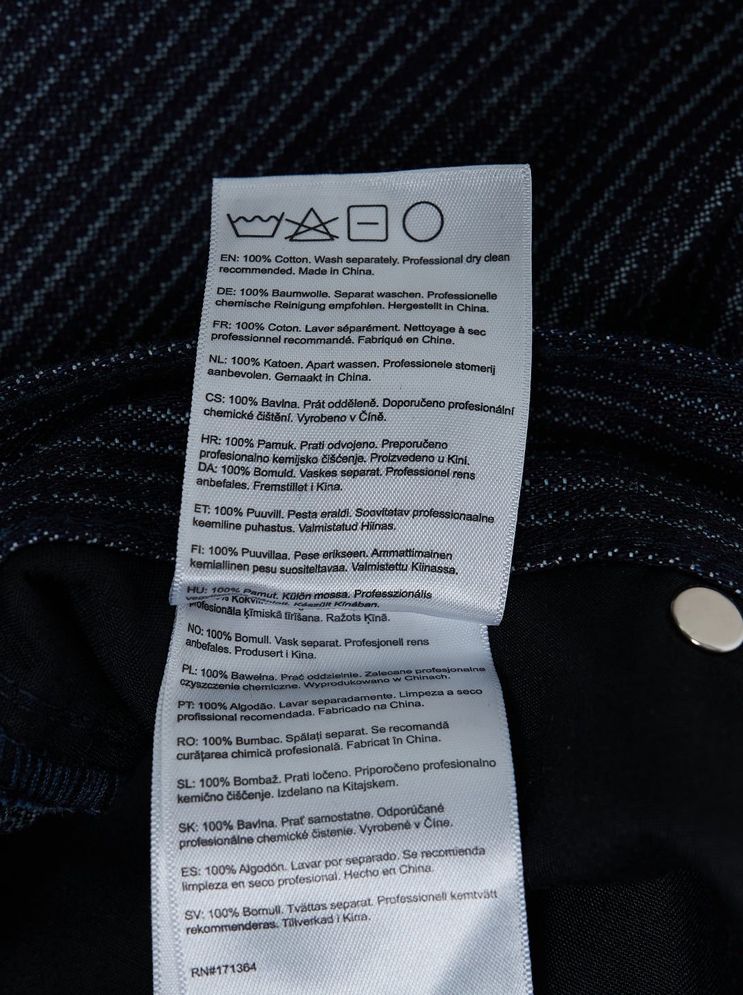 KidSuper Studios Stripe Dove Denim Pants in dark indigo with fine vertical pinstripes, a ridged waistband and a wide-leg cut, shown from the front - view 3