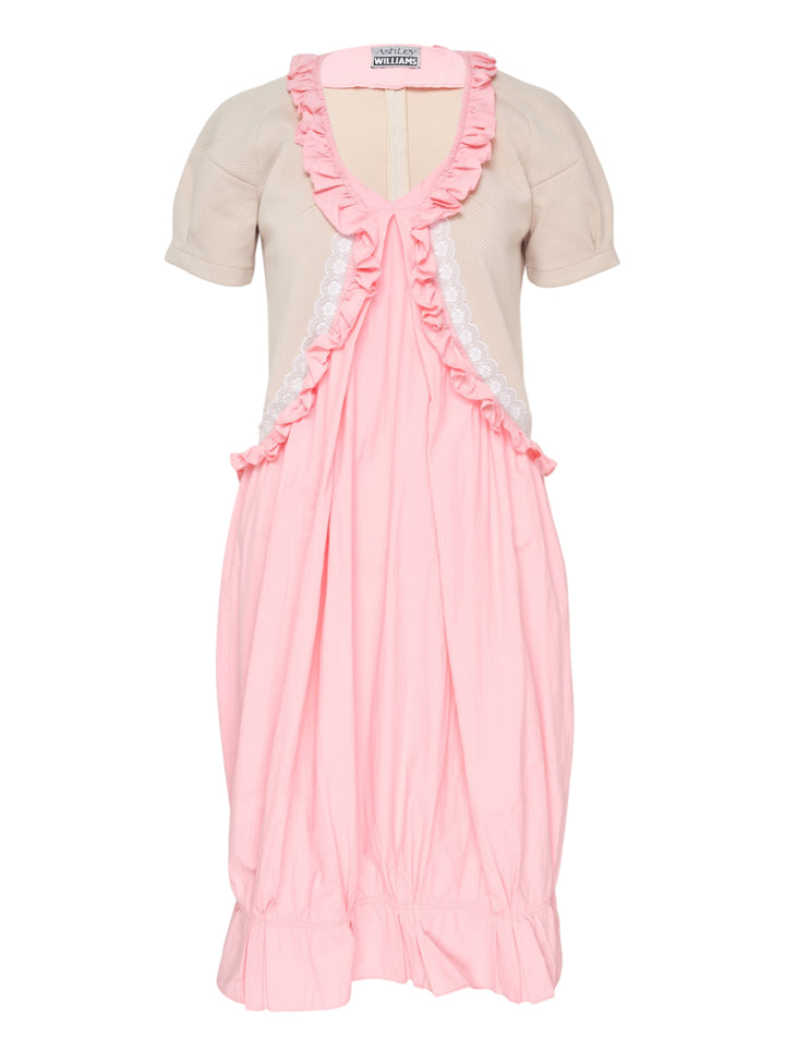 Ashley Williams Pink Anneliese Dress with beige ribbed bodice, puff sleeves, ruffled V-neckline with white lace trim, and voluminous gathered pink skirt with ruffle hem