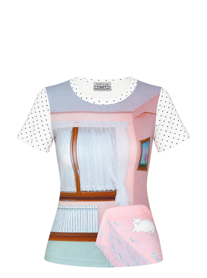 Ashley Williams Room Short Sleeve Tee with a photographic pastel bedroom interior print on the body and white polka dot short sleeves, featuring a crew neckline and fitted silhouette