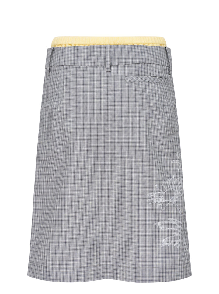 Sultry Virgin Freshman Deconstructed Gingham Skirt in grey check with yellow knit waistband, star embroidery, and 'Baby Angel' script detail on a white background - view 2