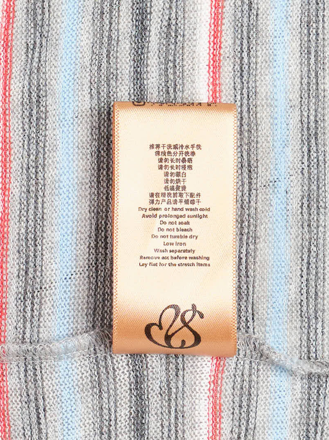 Sultry Virgin Stripe Knit Polo featuring a white Peter Pan collar, short button placket, embroidered crest, multi-stripe knit in grey, blue, and red, and a ruffle hem with sheer tulle trim - view 4