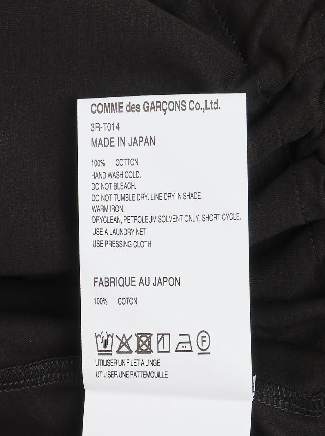 Noir Kei Ninomiya black short-sleeve cotton peplum tee with ruched gathered waistband, drawstring self-ties, and a tiered flared hem, shown flat on a white background - view 3