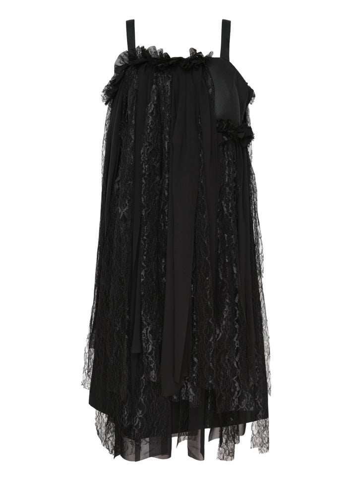 Comme des Garçons black sheer layered raschel lace dress with ruffled neckline, floral appliqués, mixed tulle and lace vertical panels, and an asymmetric raw-edged hem