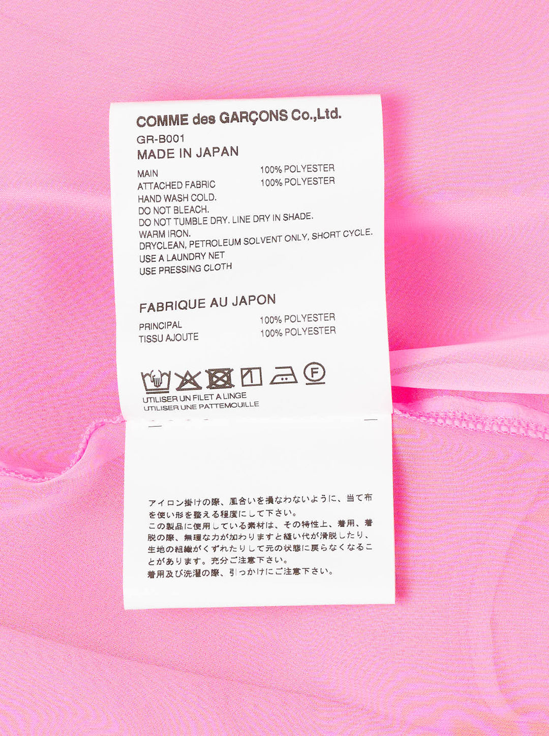 Comme des Garçons sheer fuchsia pink longline tailored blouse with point collar, white button-front fastening, chest patch pocket, and structured cuffs - view 4