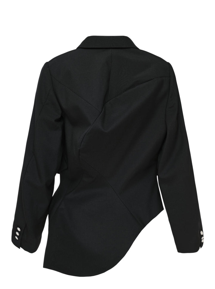 Comme des Garçons black wrap blazer with asymmetric curved hem panel exposing satin lining, peak lapels, jewel-set buttons, and structured shoulders, displayed flat on white background - view 2