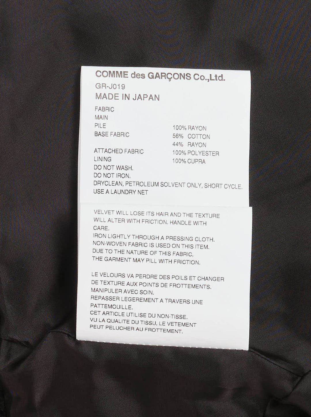 Comme des Garçons cropped asymmetric blazer in black faux fur with contrast collar and flap details - view 4