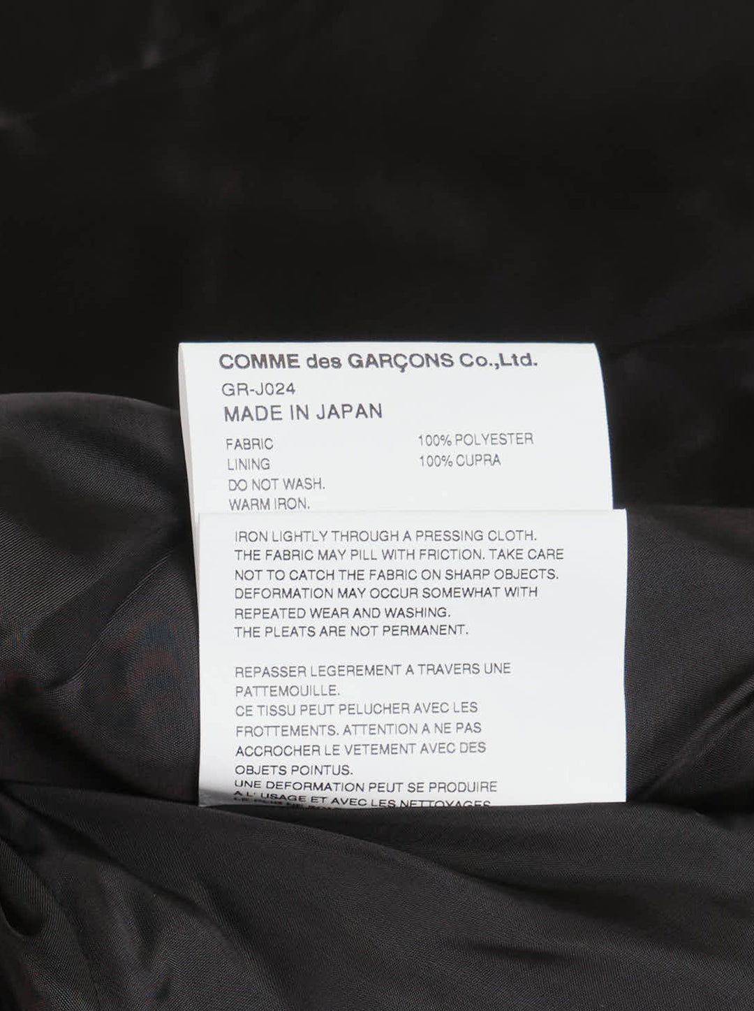 Comme des Garçons deconstructed black floral jacquard jacket with cascading accordion-pleated ruffle panel from collar to hem, shown on white background - view 3