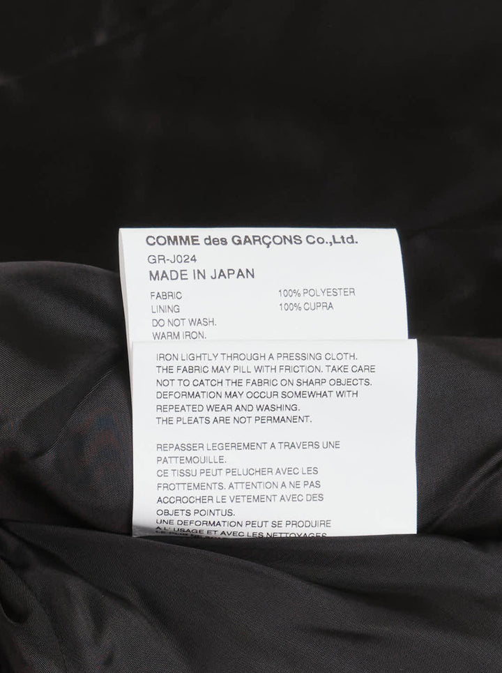 Comme des Garçons deconstructed black floral jacquard jacket with cascading accordion-pleated ruffle panel from collar to hem, shown on white background - view 3