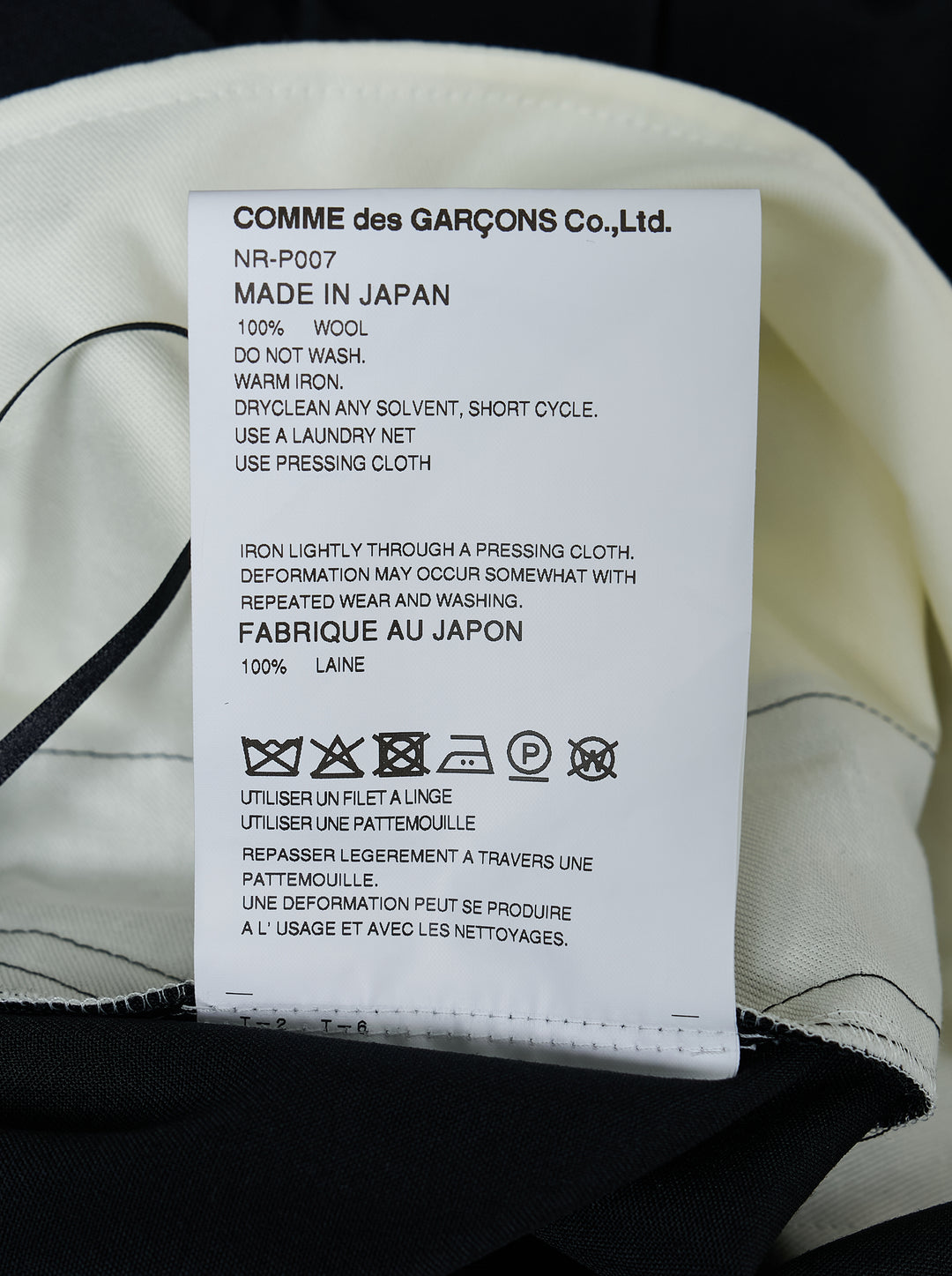 Black cropped wide-leg wool pants with an elasticated waistband and drawstring tie hems by Comme des Garçons Girl - view 3