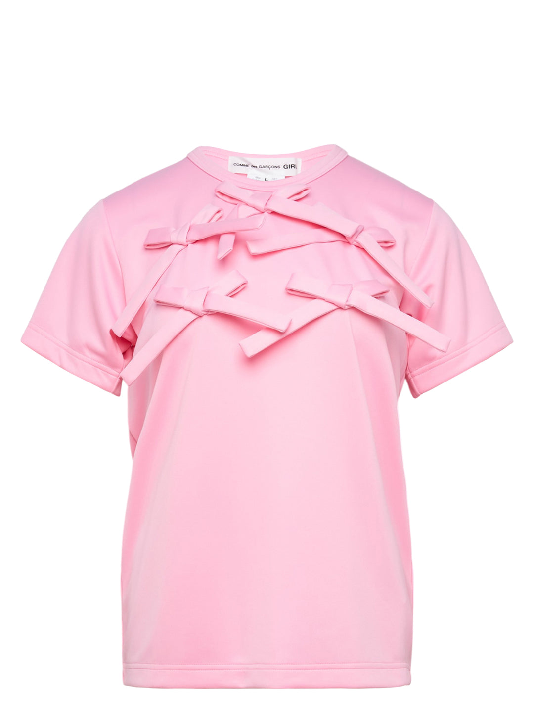 Comme des Garçons Girl pink short sleeve tee with multiple ribbon bows scattered across the chest, relaxed boxy fit with turned-back cuffs and ribbed hem