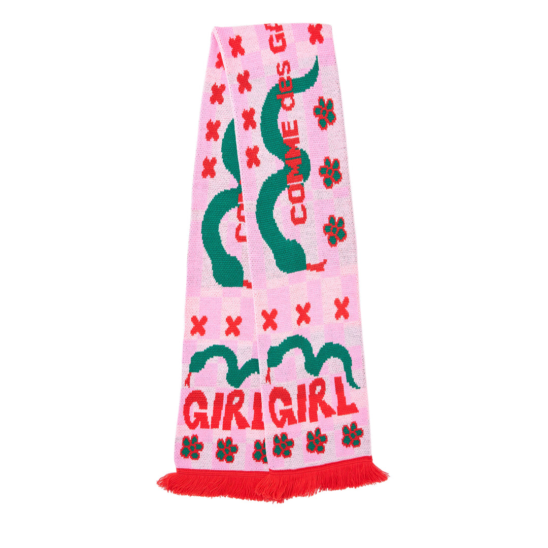 Comme des Garçons Girl knitted acrylic stole in pink gingham with teal snake motifs, red cross and cherry blossom detailing, GIRL logo lettering, and red fringe trim at both ends