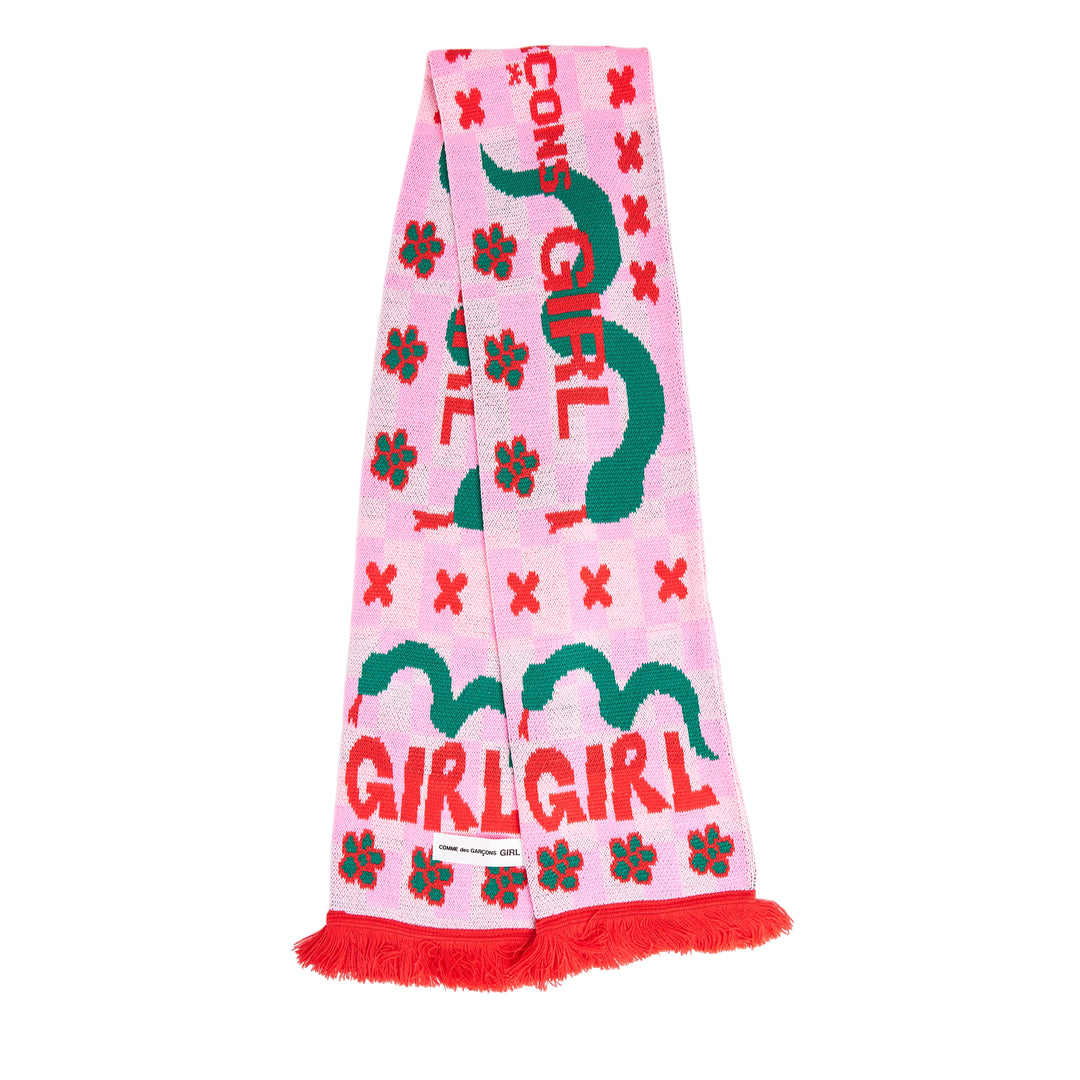 Comme des Garçons Girl knitted acrylic stole in pink gingham with teal snake motifs, red cross and cherry blossom detailing, GIRL logo lettering, and red fringe trim at both ends