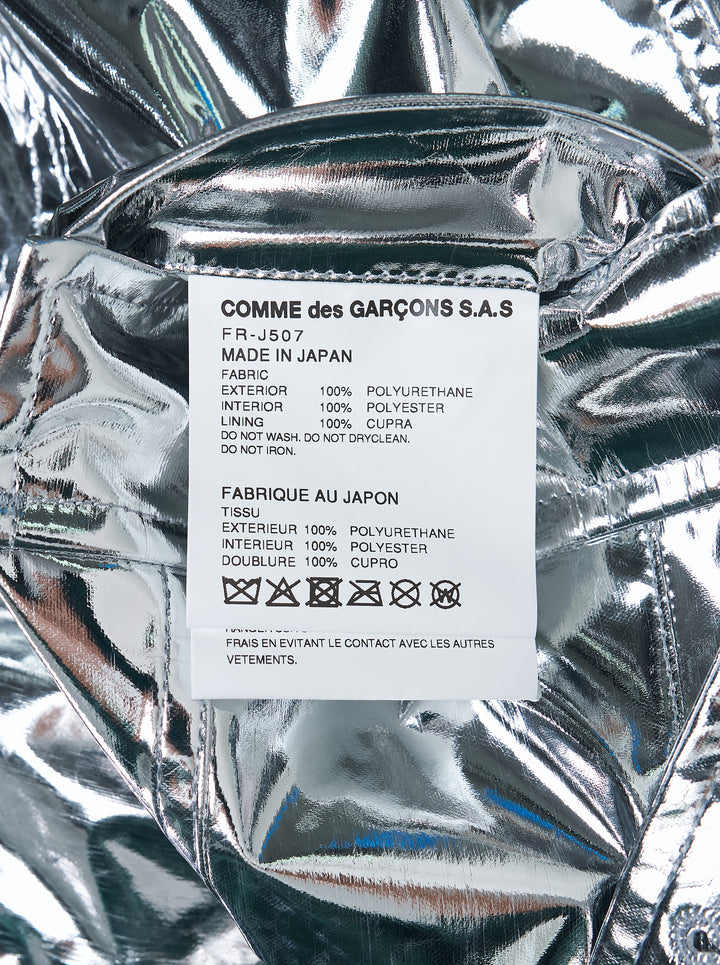 Comme des Garçons Shirt metallic silver blazer with notch lapels, three buttons and flap pockets, shown on a white background - view 3
