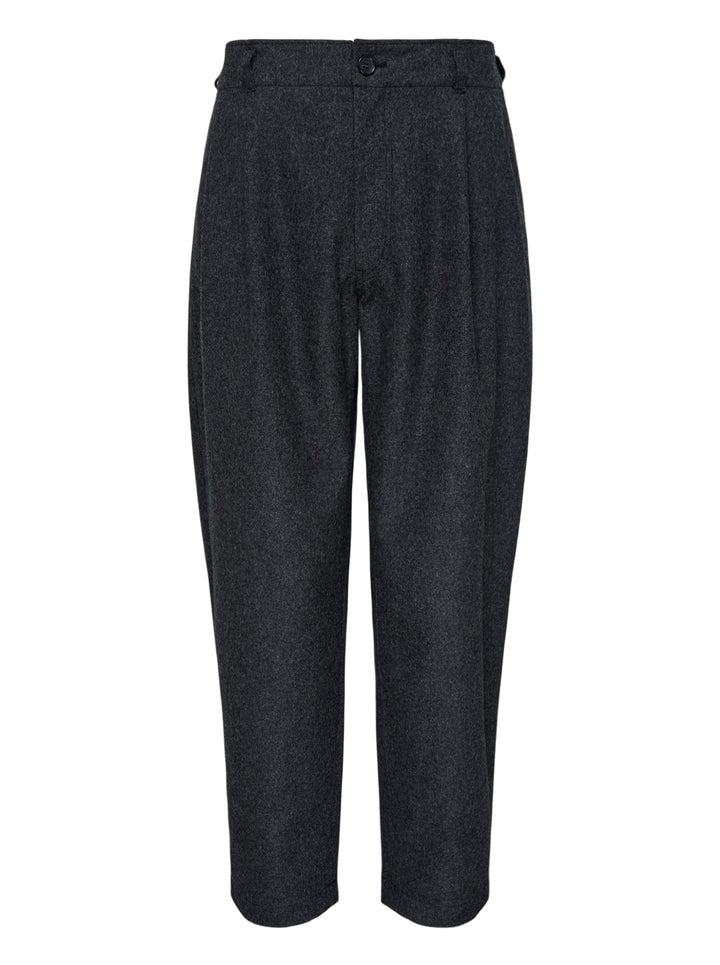 Charcoal heathered relaxed tapered pants with pleated front and button closure by Comme des Garçons Shirt