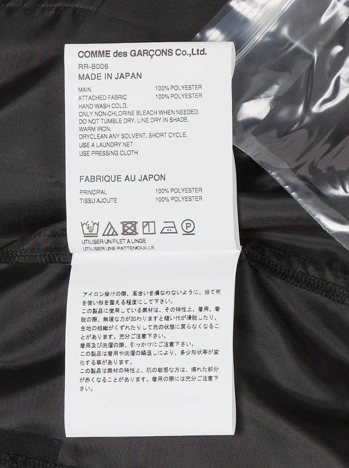 Black sheer organza longline blouse with a rounded collar, button front and gathered taffeta ruffles at the hem by Comme des Garçons Comme des Garçons - view 3