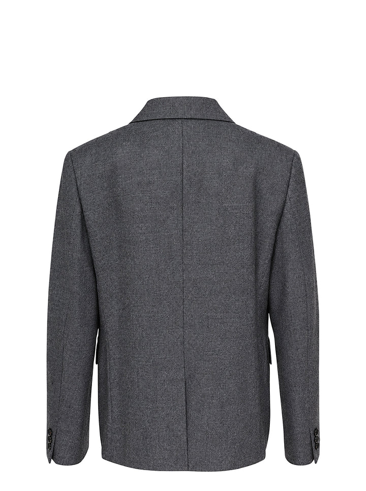 Comme des Garçons Comme des Garçons single-breasted tailored blazer in mid-grey mélange wool, featuring notched lapels, three-button closure, chest welt pocket, and twin flap hip pockets, shown flat on a white background. - view 2