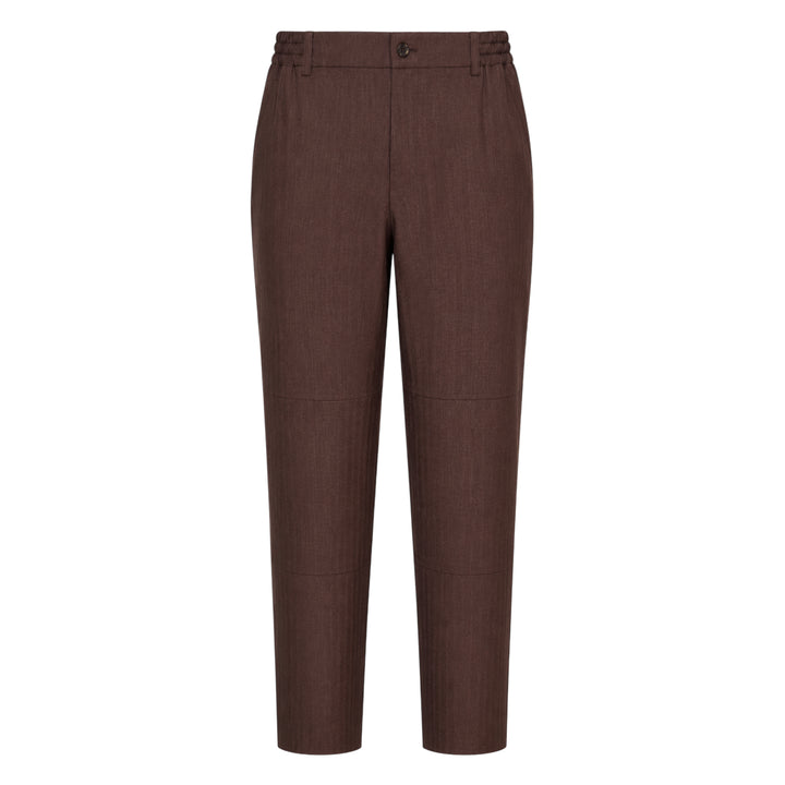 Comme des Garçons Homme Deux wool mini herringbone pants in brown, featuring a tapered leg, elasticated waistband, and panelled knee construction, shown flat on a white background