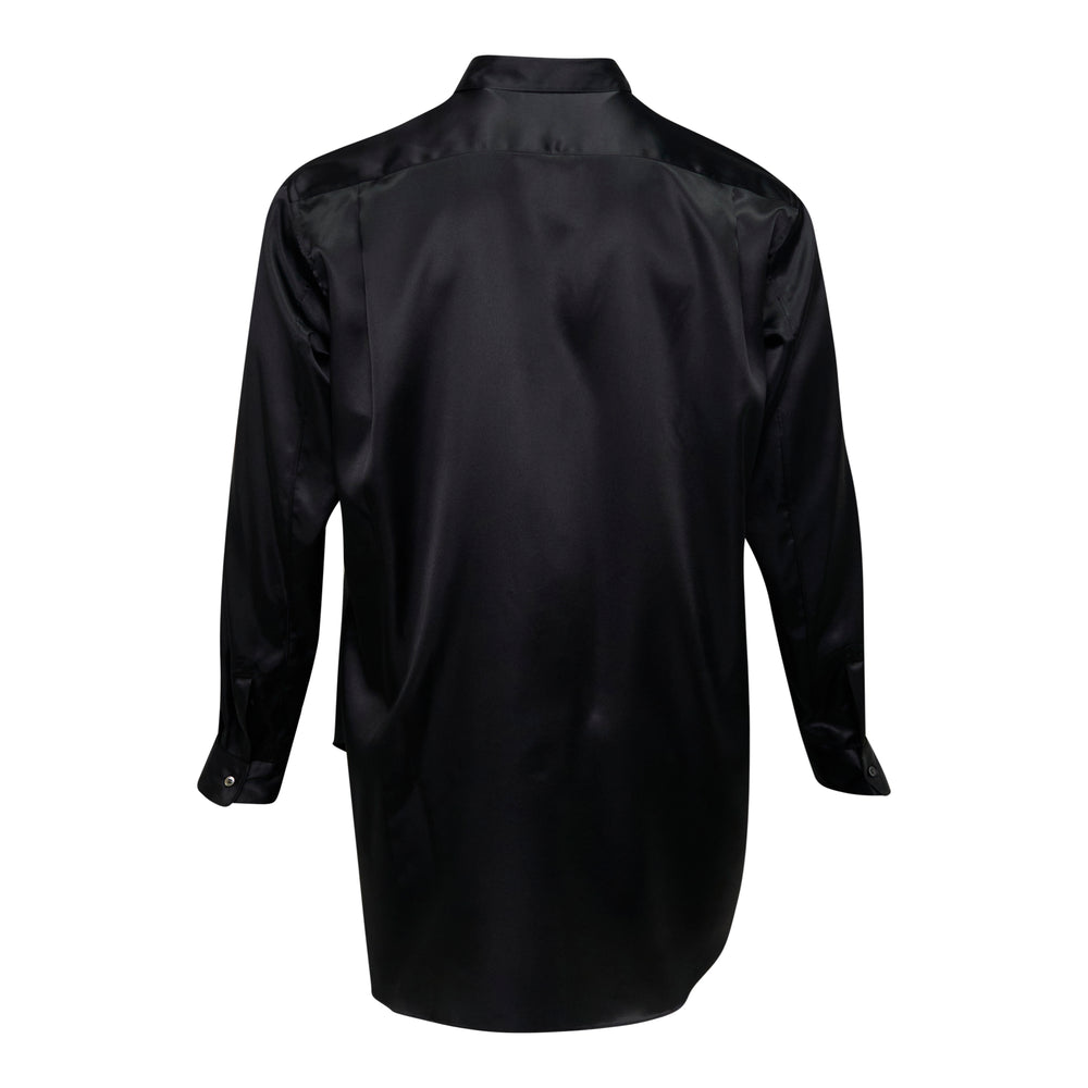 Comme des Garçons Homme Plus black polyester satin long sleeve shirt with deconstructed bib panel, point collar, and elongated curved hem, displayed on a white background - view 2
