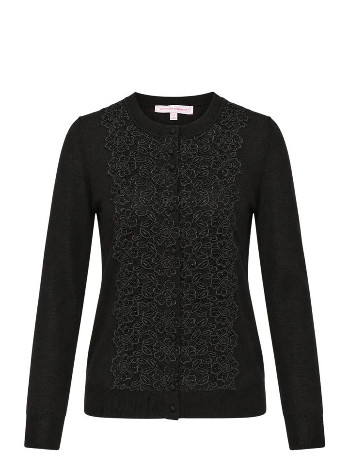 Carolina Herrera black knit cardigan with tonal floral lace centre front panel and covered button fastening, displayed on a flat lay against a white background