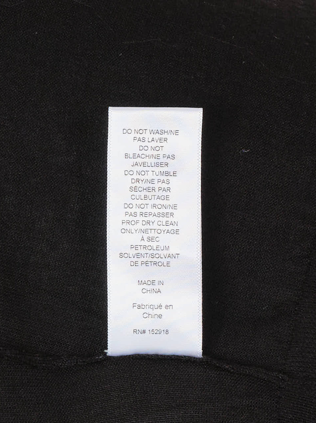 Carolina Herrera black knit cardigan with tonal floral lace centre front panel and covered button fastening, displayed on a flat lay against a white background - view 4
