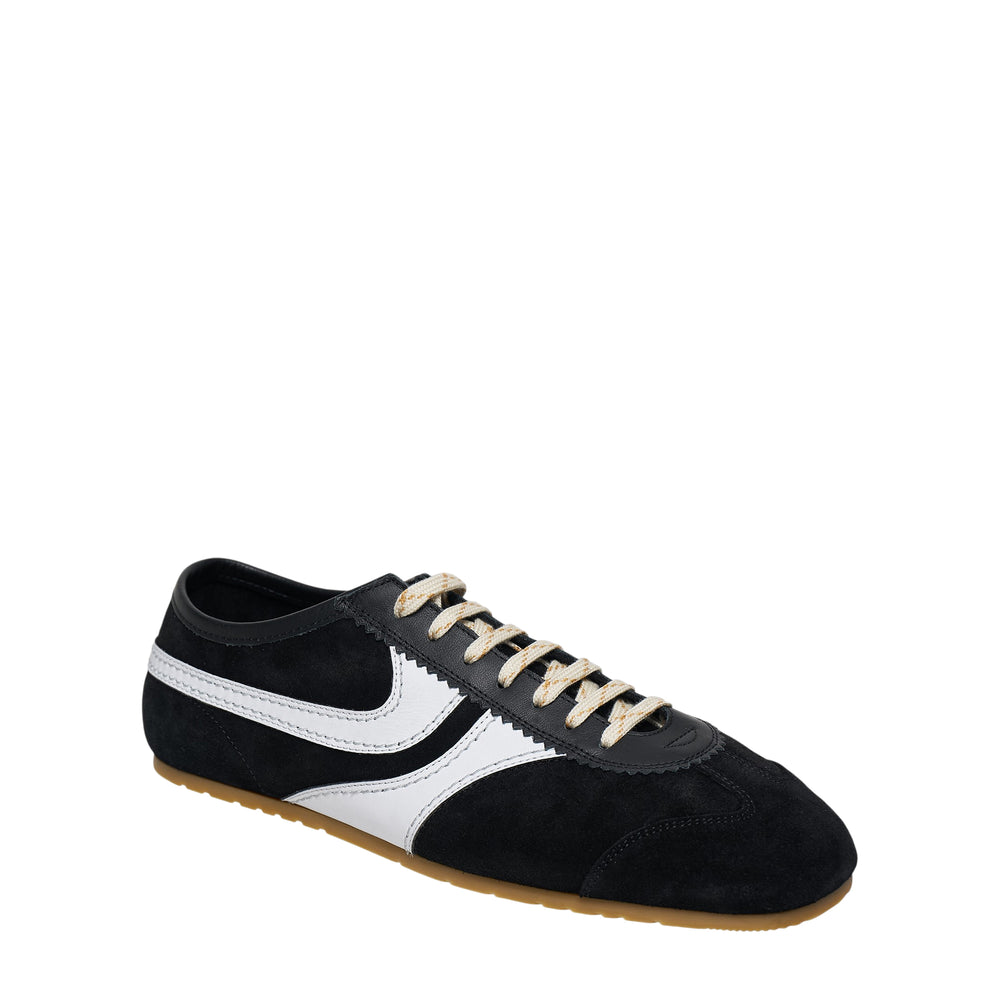 Dries Van Noten slim sneaker in burgundy suede with cream nappa leather overlays, cream laces, and a gum rubber outsole, shown in profile