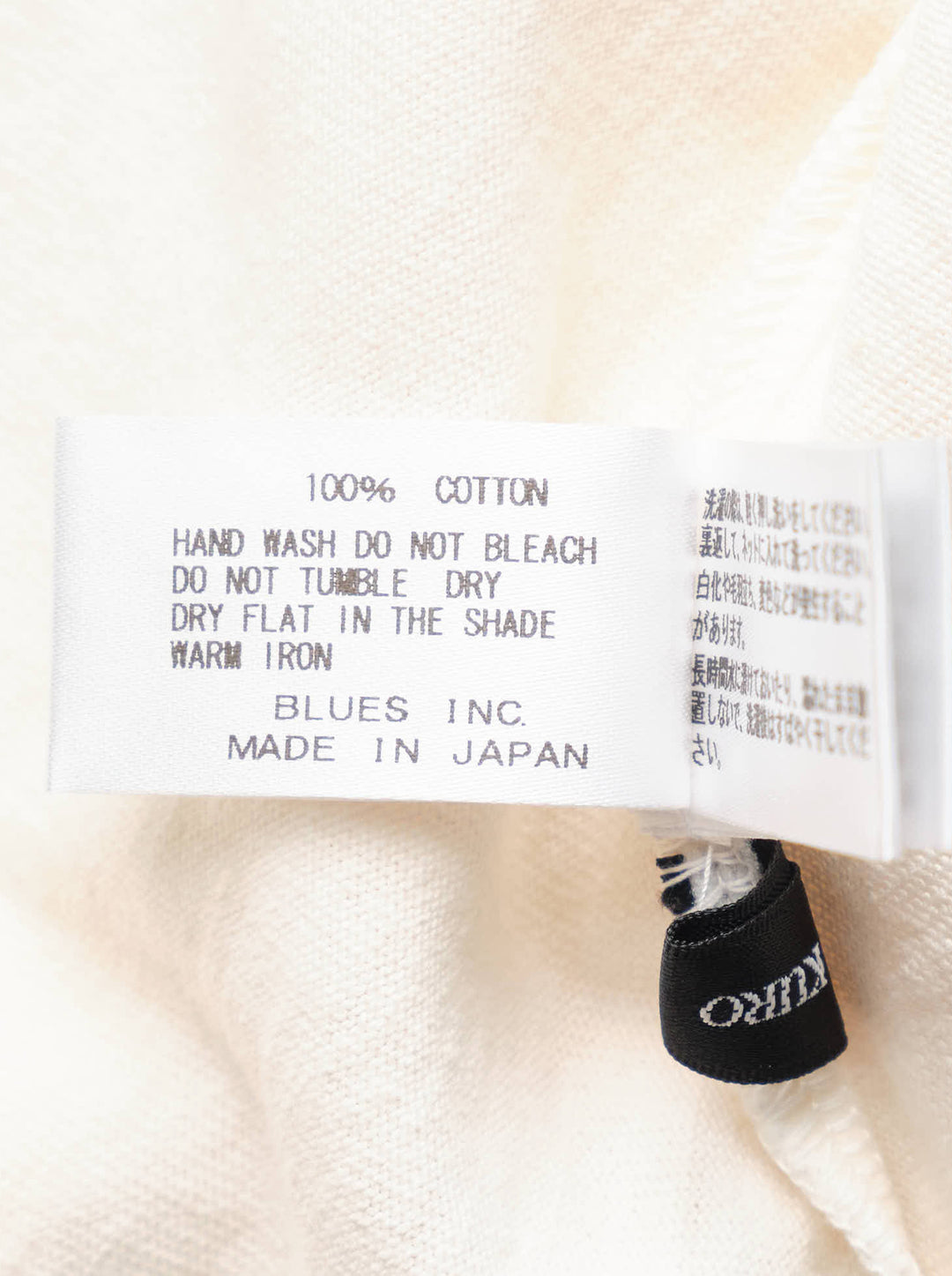 Cream short sleeve Maison Kitsuné x Kuro t-shirt featuring an illustrated fox in blue patchwork denim workwear with Kuro Kitsuné (Paris) text - view 3