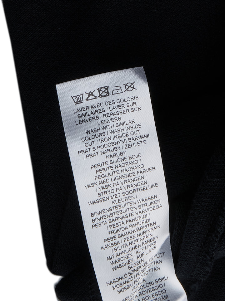 Maison Kitsuné black short sleeve comfort polo shirt with red embroidered running fox logo at the chest and three-button placket - view 3