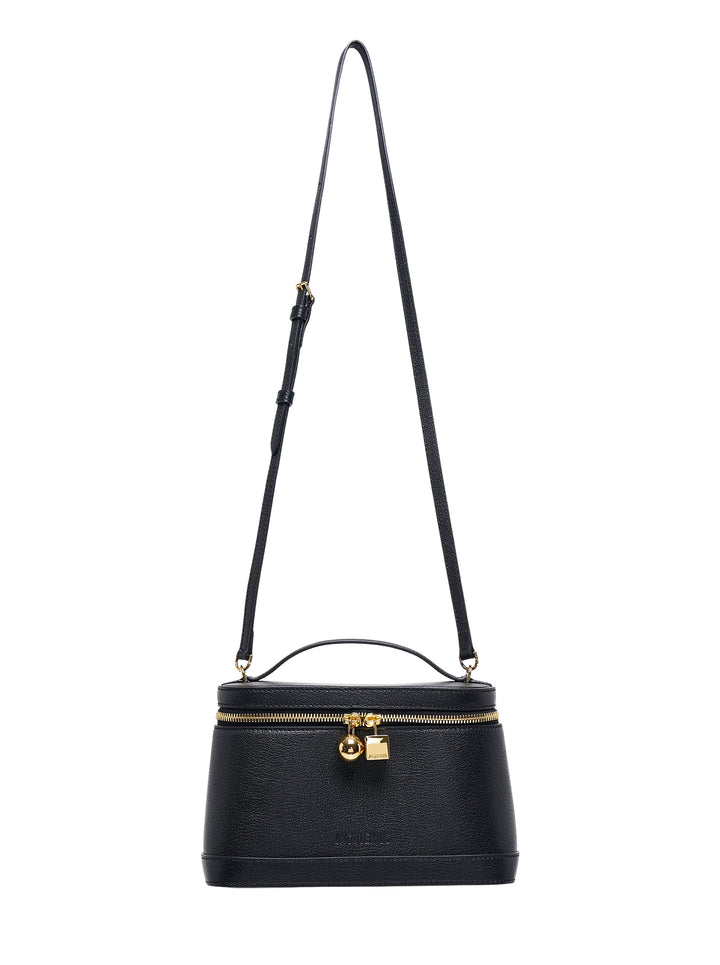 Jacquemus Le Petit Vanity bag in black grained leather with gold-tone zip, charms, top handle and long adjustable crossbody strap