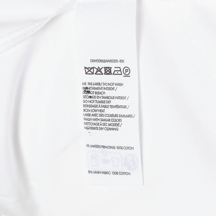 Jacquemus La Robe Colombe white long-sleeve mini dress with deep V-neckline, elasticated waist, front patch pocket, and navy logo tape at the back collar - view 3