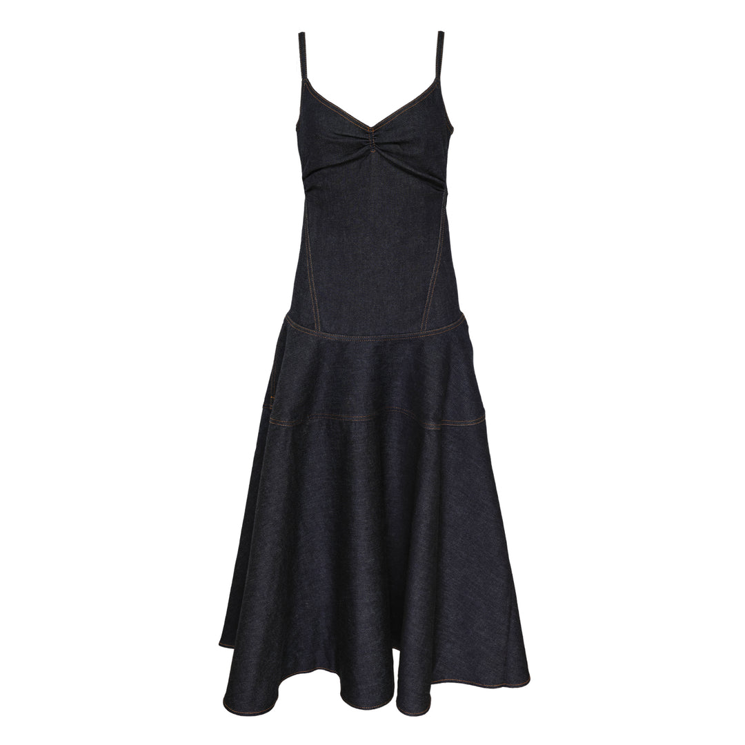 Jacquemus Pina dark indigo denim midi dress with ruched V-neckline, spaghetti straps, and a full drop-waist flared skirt with contrast topstitching, displayed on a plain white background