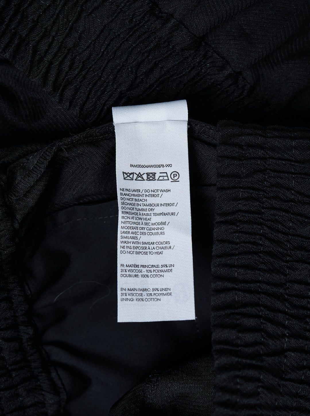 Jacquemus Le Pantalon Miami black wide-leg trousers with smocked elasticated waistband and pressed centre crease, front view - view 3