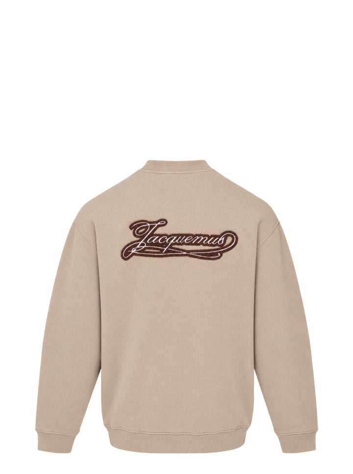 Jacquemus Torneo sweatshirt in taupe with ribbed mock neck and a Le Palmier palm illustration label at the hem - view 2