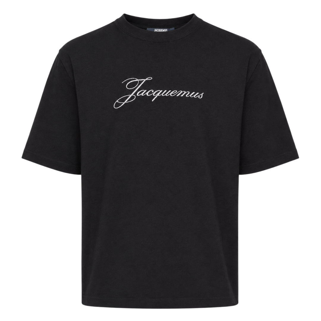 Jacquemus black oversized short sleeve tee with embroidered cursive script logo across the chest