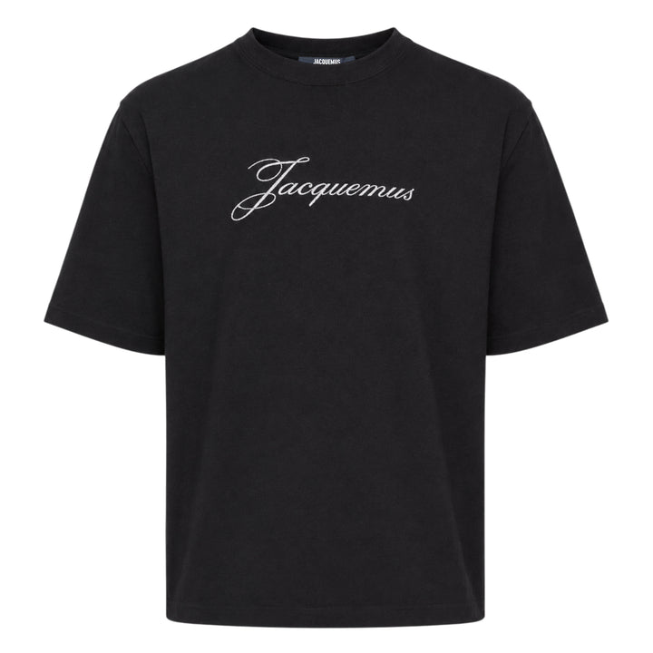 Jacquemus black oversized short sleeve tee with embroidered cursive script logo across the chest