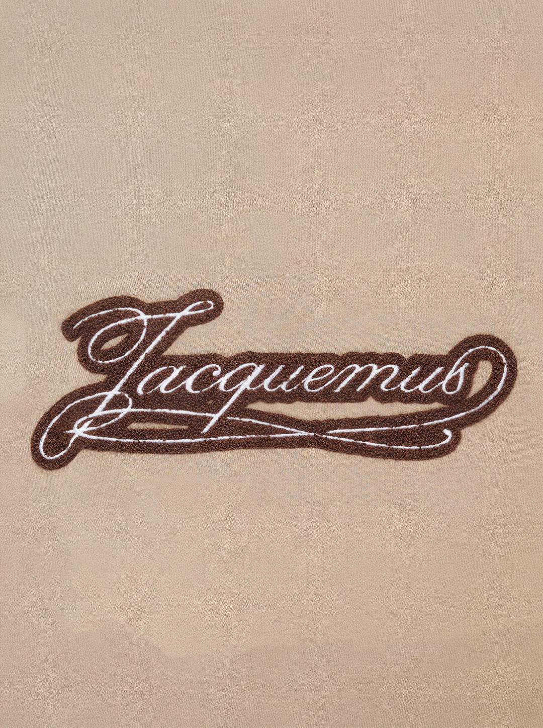 Jacquemus Le T-shirt Torneo short sleeve tee in taupe with a woven botanical label at the hem - view 4