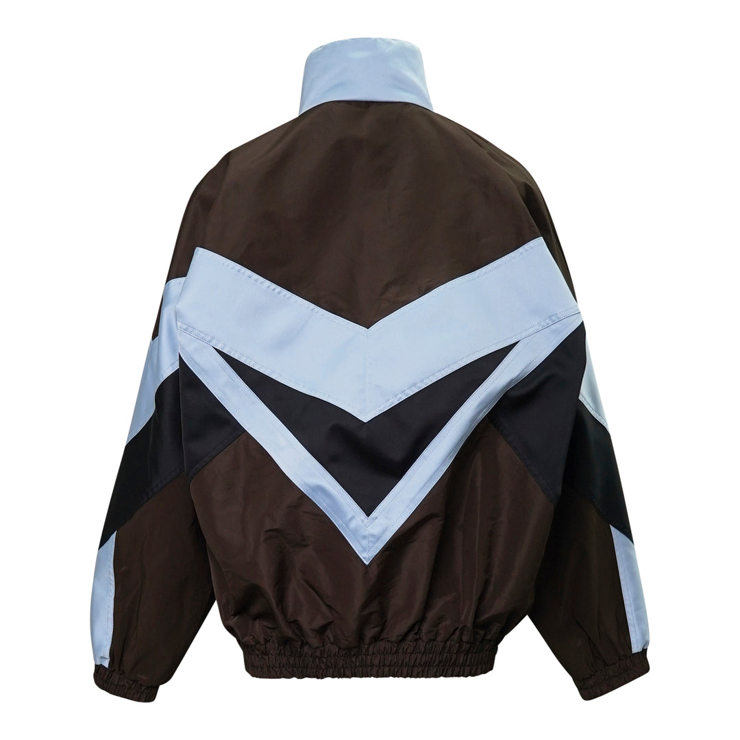 N°21 oversized sports blouson in dark brown and powder blue with bold navy chevron colourblock panels, funnel neck, and full-length zip closure - view 2