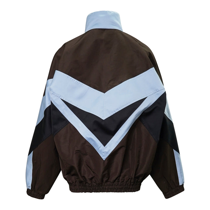 N°21 oversized sports blouson in dark brown and powder blue with bold navy chevron colourblock panels, funnel neck, and full-length zip closure - view 2