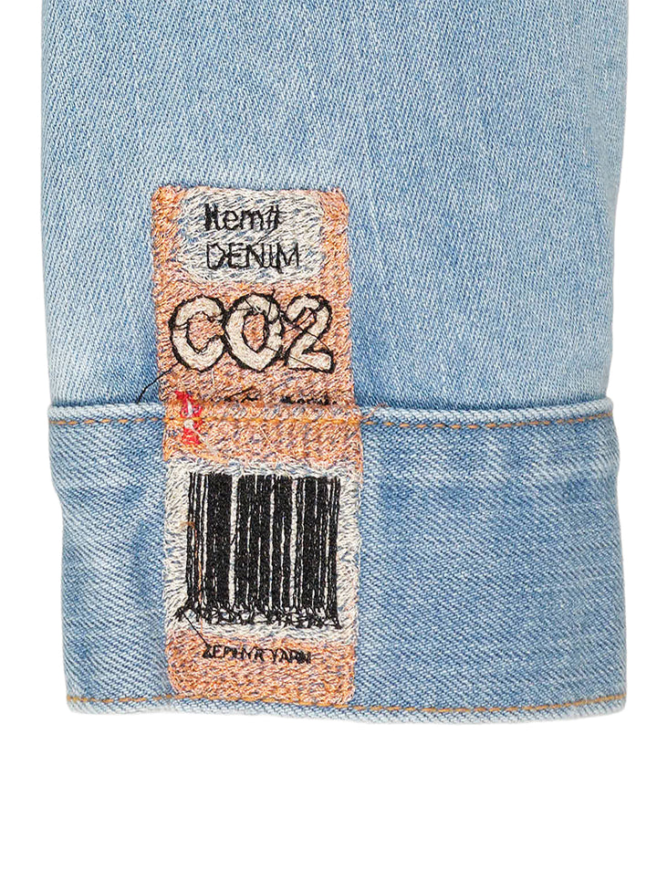 doublet Air Yarn Faded Denim Jacket in light-wash blue with archival printed patch labels on the chest pocket and cuff, featuring amber topstitching and gunmetal button fastening - view 4