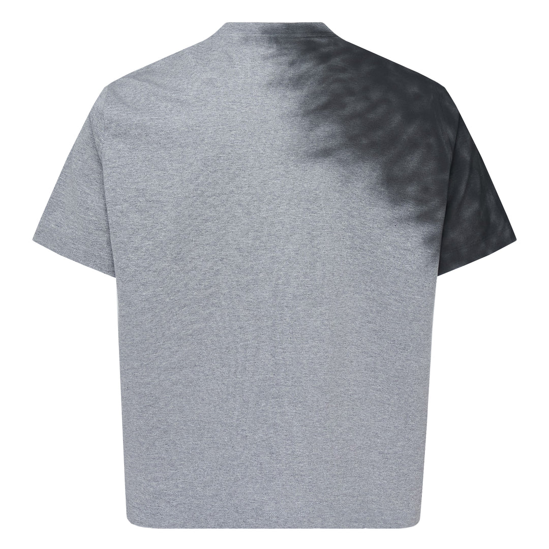 doublet Exhaust Stained Tee in grey marl with shadow dye effect and a retro red sports car graphic on the chest, FW26
