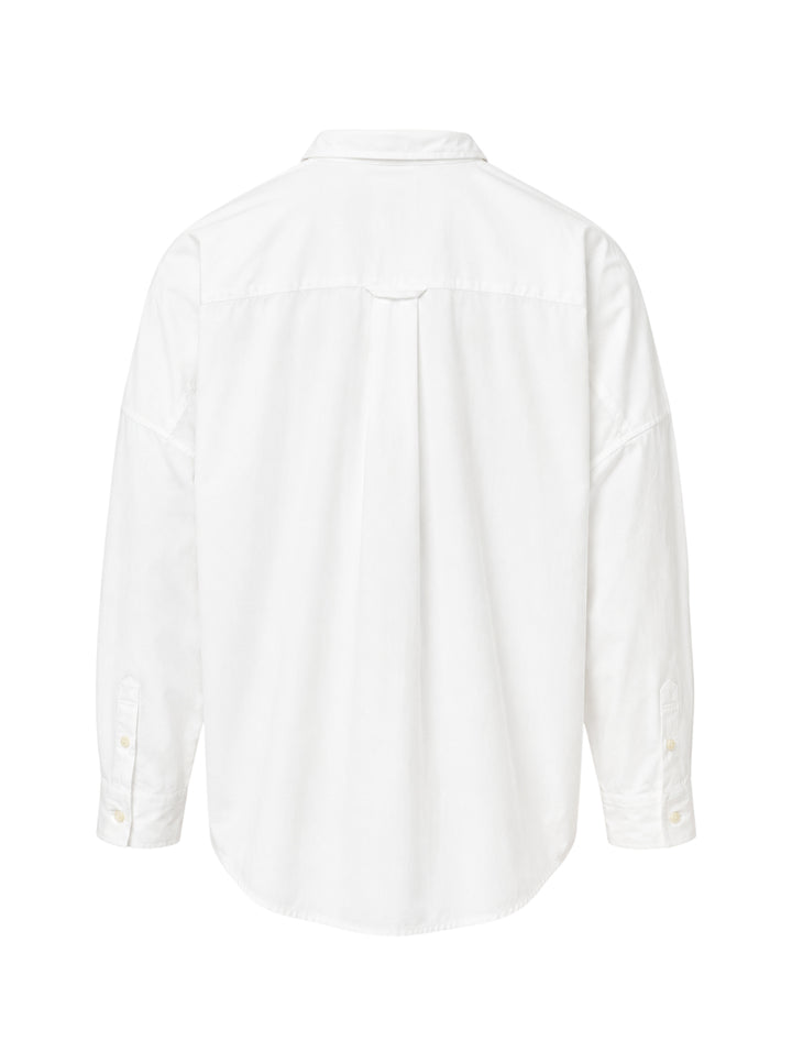 doublet Air Yarn Long Sleeve Shirt in white with embroidered CO2 Zephyr patch on the chest and repeated CO2 stamp graphic on the lower front, shown flat on a white background - view 2
