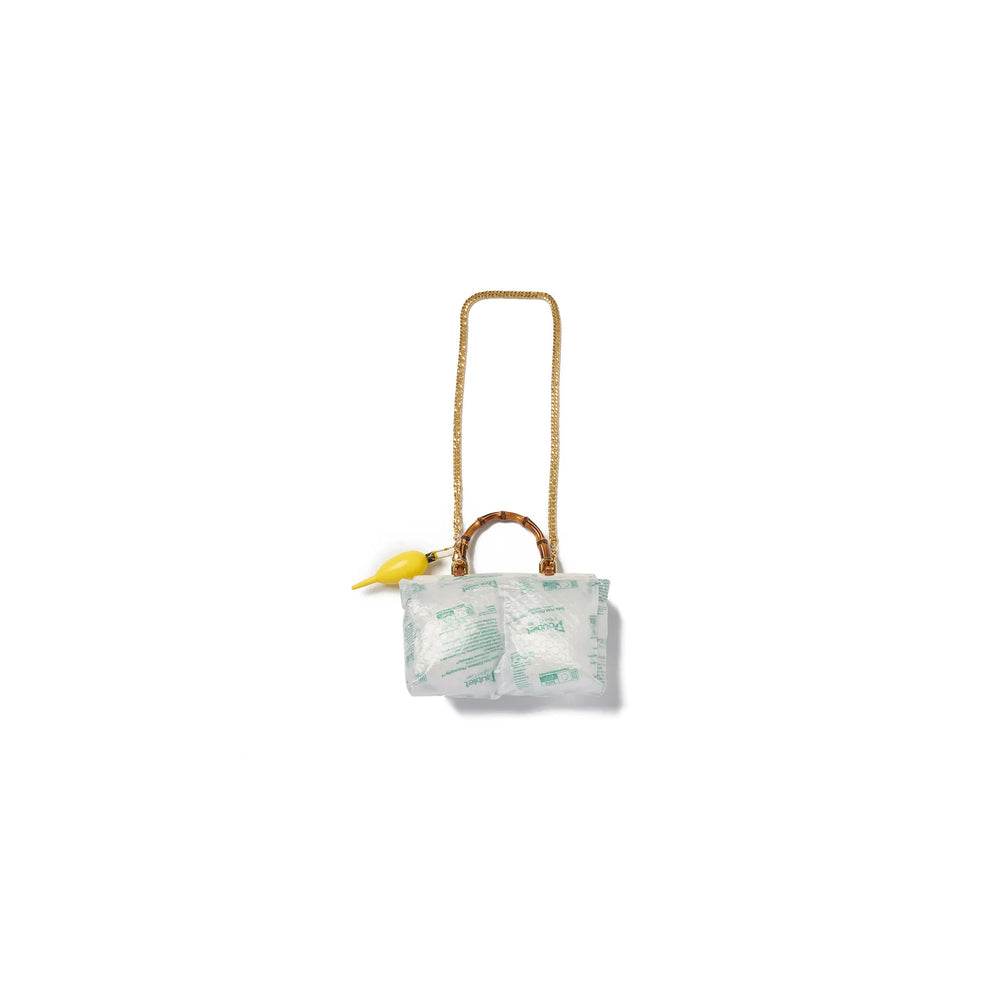 doublet Air Pillow Bamboo Handle Bag wrapped in inflatable air cushions with a gold chain strap, bamboo handle, tan leather turn-lock and yellow air pump charm - view 2