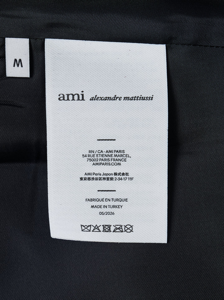 AMI black leather zipped jacket with pointed collar, dual-zip front closure and slanted welt pockets, shown from the front - view 4