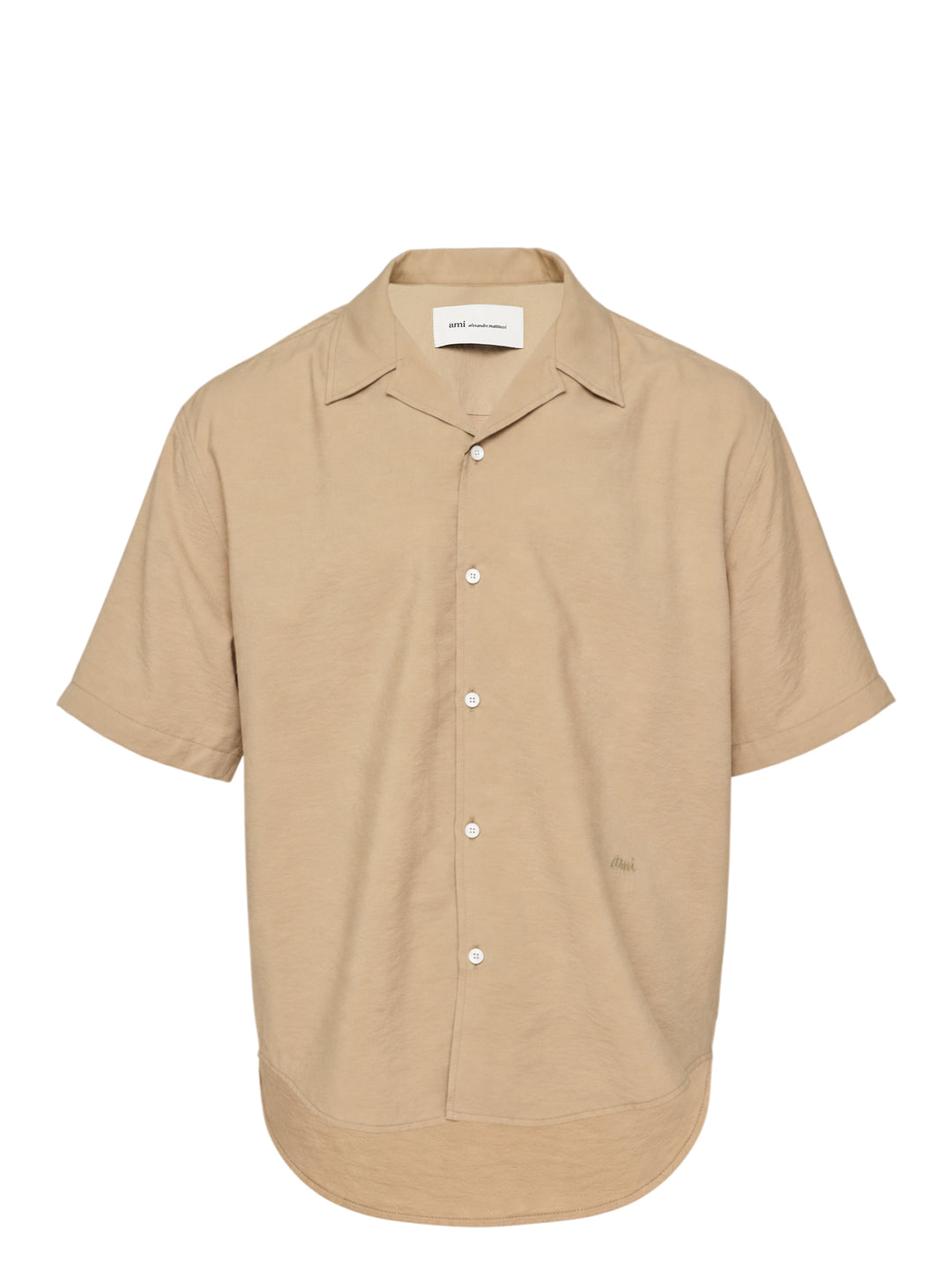 AMI Alexandre Mattiussi short sleeve boxy shirt in beige with camp collar, white shell buttons, and tonal AMI script embroidery at the chest