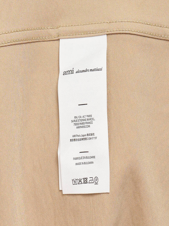 AMI Alexandre Mattiussi short sleeve boxy shirt in beige with camp collar, white shell buttons, and tonal AMI script embroidery at the chest - view 4