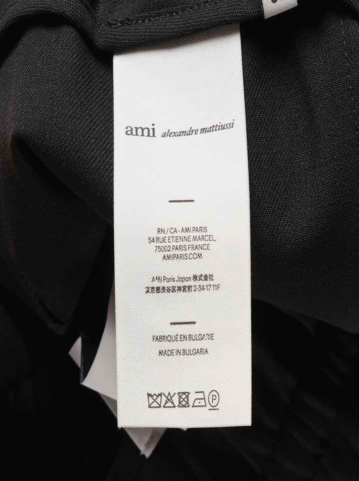 AMI Elasticated Large Bermuda Shorts in black with wide-leg silhouette, pressed creases, and elasticated drawstring waistband - view 3
