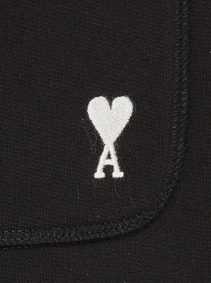 AMI Contrast Wide Leg Sweatpants in black with elasticated drawstring waistband and wide straight-cut silhouette, shown flat against a white background - view 3